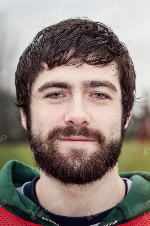 Preview: Portrait of a Caucasian man with brown hair and a beard.