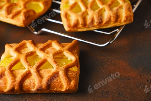 Preview: fresh crispy puff pastry mini pies with pear and lime jam