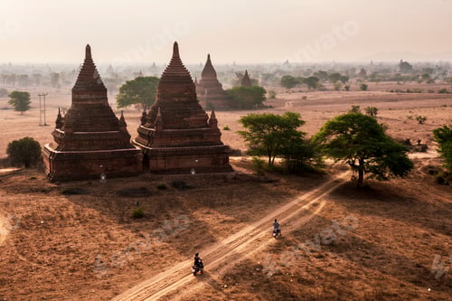 Preview: Tourists exploring the Temples of Bagan (Pagan) at sunrise, Myanmar (Burma)