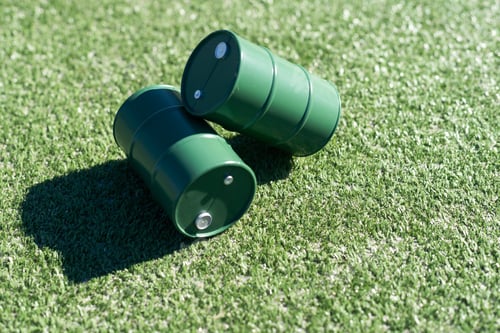 Preview: oil barrels on green background