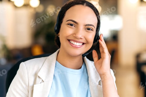 Preview: Photo of a positive confident mixed race woman, with headset, call center agent, support service