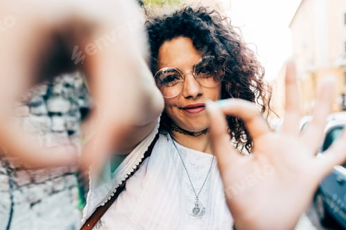 Preview: Woman making hand gestures, Milan, Italy