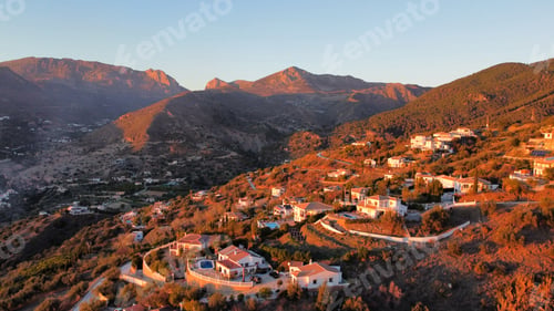 Preview: Golden hour on houses on the hillside