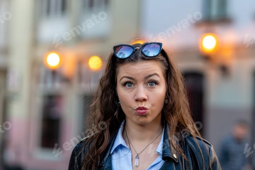 Preview: Woman Outdoors Making Funny Face Wearing Sunglasses