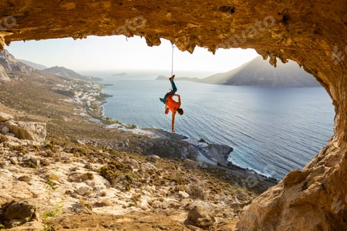 Preview: Rock climber hanging on rope after falling of cliff