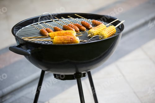 Preview: Corns and hot dogs on grill
