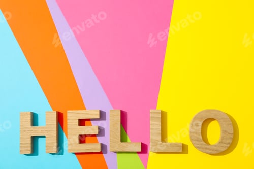 Preview: Word Hello lined with wooden letters on multicolor background