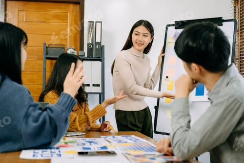 Preview: Asian businessman and woman people meeting in home office. Employee brainstorm and work as team