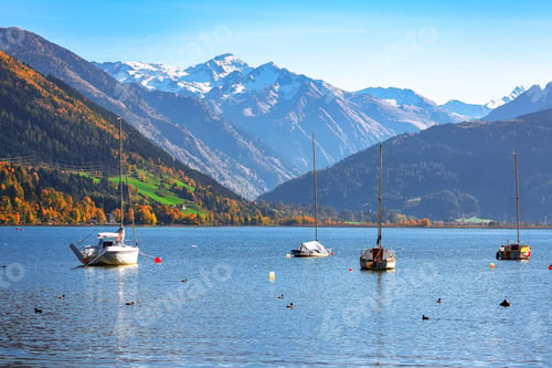 Preview: Spectacular autumn view of lake and yachts in city Sell Am See.