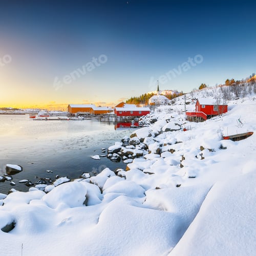 Preview: Stunning winter scenery of Moskenes village with ferryport and famous Moskenes parish Churc