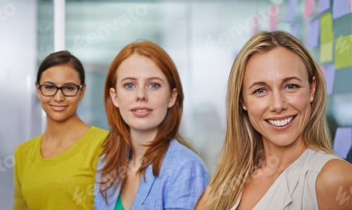 Preview: Not just pretty faces. Three attractive female colleagues ready for the working day.