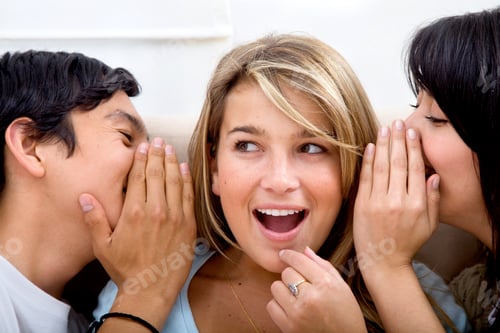 Preview: Group Of Friends Telling A Secret At Home