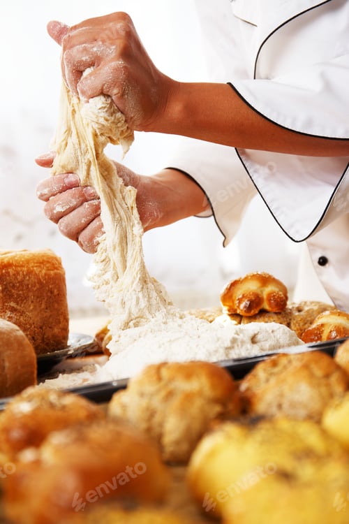 Preview: Cook hands preparing dough for homemade pastry