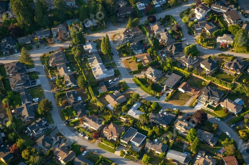 Preview: Aerial view of the residential homes during a vibrant sunny summer day