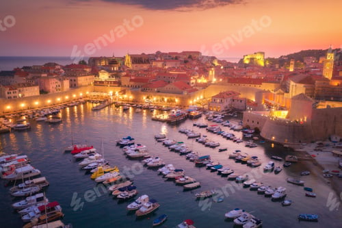 Preview: Aerial view of houses with red roofs at night in Dubrovnik