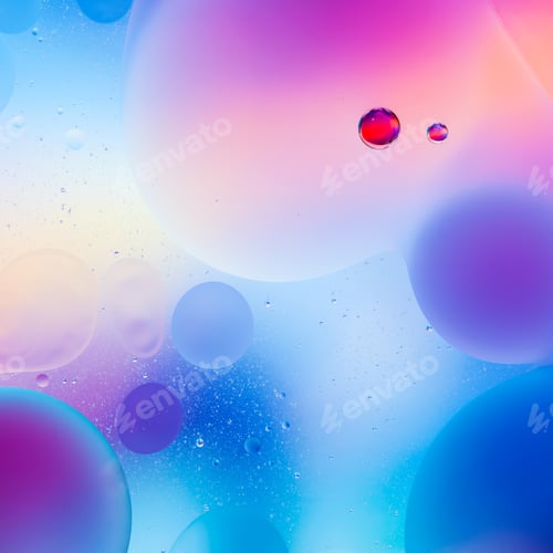 Preview: macro of colorful oil drops on water