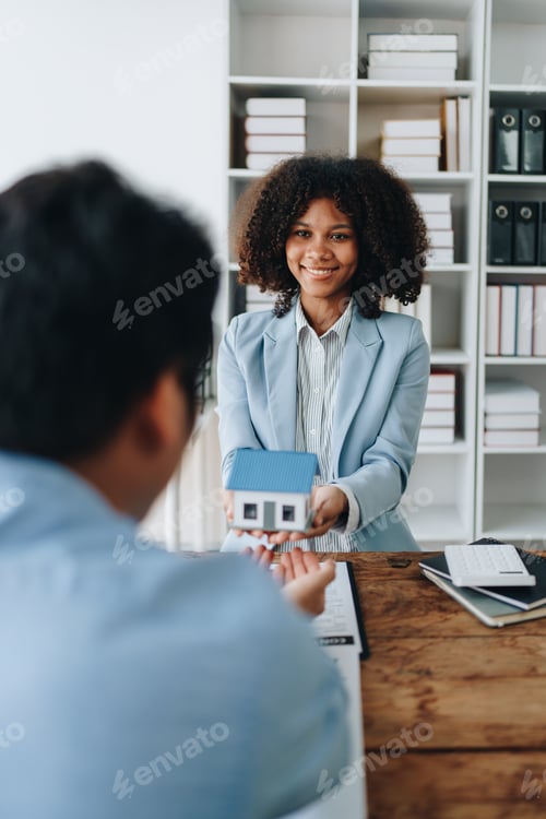 Preview: Female African american Real estate company to buy houses and land are delivering keys