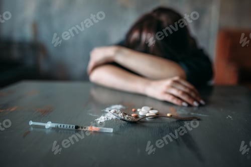 Preview: Female junkie hand hand reaching for the dose