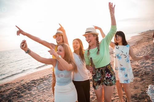 Preview: young people are making a selfie at the beach