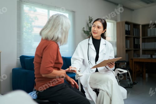 Preview: Female doctor consulting senior patient about healthcare