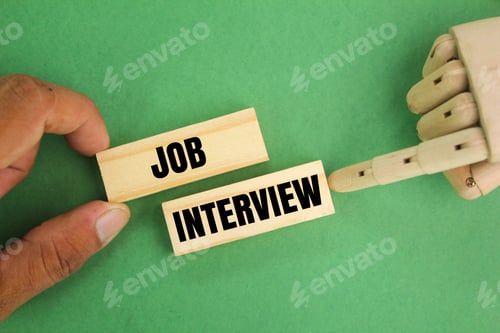 Preview: hand holding a stick with the word job interview. the concept of human resources or HR.