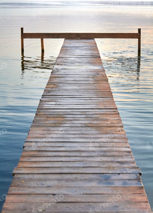 Preview: Vertical shot of a wooden pier in the sea