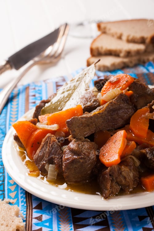 Preview: Delicious bourguignon beef stew on white plate