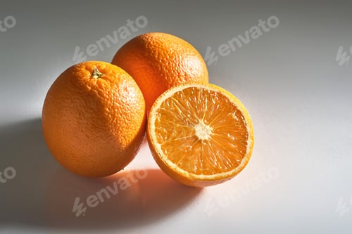 Preview: Delicious fresh oranges isolated on white background.