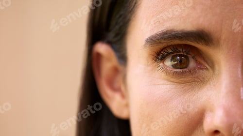 Preview: Close Up Beauty Portrait Of Eye Of Mature Woman Against Natural Background
