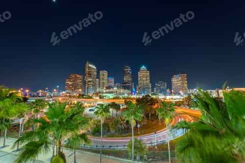 Preview: American city skyline with brightly illuminated high commercial buildings