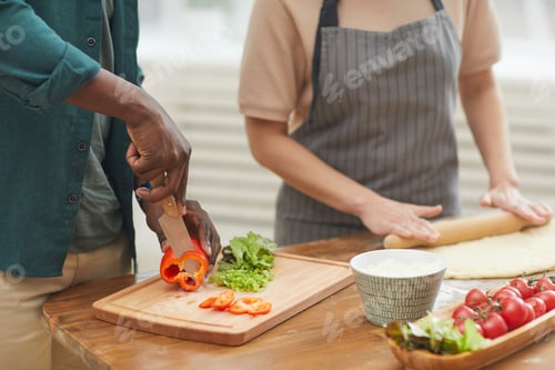 Preview: Couple preparing dinner together