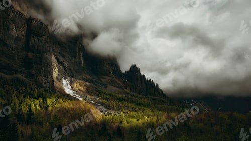 Preview: Ray of light on cliffs and forest in the french alps