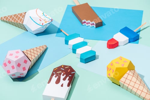Preview: handmade origami ice cream on blue and turquoise paper