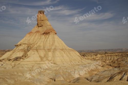 Preview: The Castildetierra of the Bardenas Reales in Navarra with background clouds with copypaste. Spain