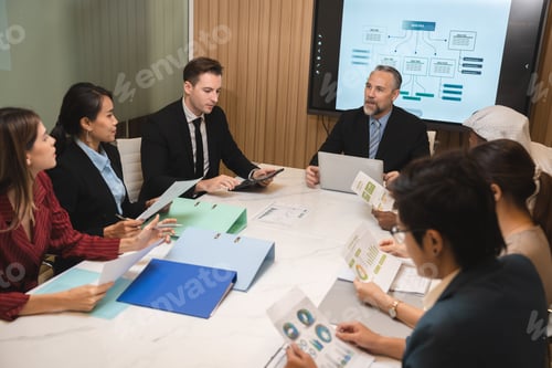 Preview: diverse business team leader discuss financial paperwork, Smart businessman and businesswoman