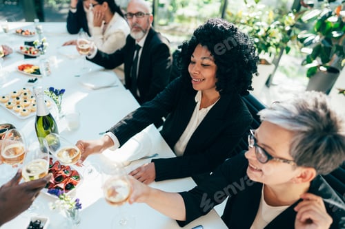 Preview: Businessmen and businesswomen making a corporate party