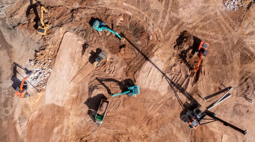 Preview: Aerial view road motor grader flatting dirt road surface, Motor grader road construction grader.
