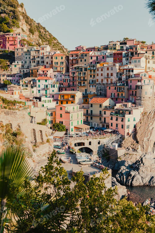 Preview: a coastal town in Italy, showcasing the colorful houses that line the overlooking the sea,