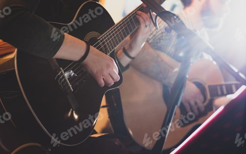 Preview: Playing classic guitar. Selective focus.