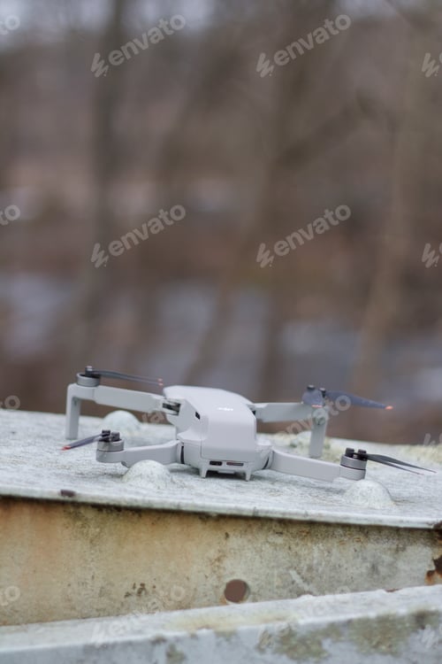 Preview: Close up shot of a white mini camera drone
