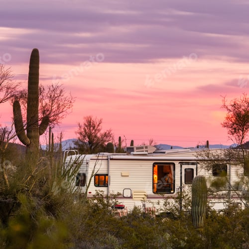 Preview: Fifth wheel camping trailer on desert campground