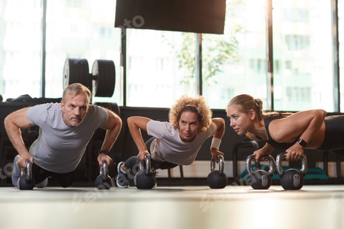 Preview: People training with dumbbells