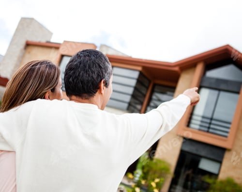 Preview: Couple Pointing At Their Lovely Dream Home