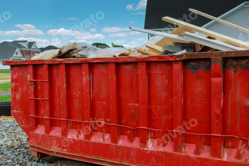 Preview: Dumpster with left over wood from construction