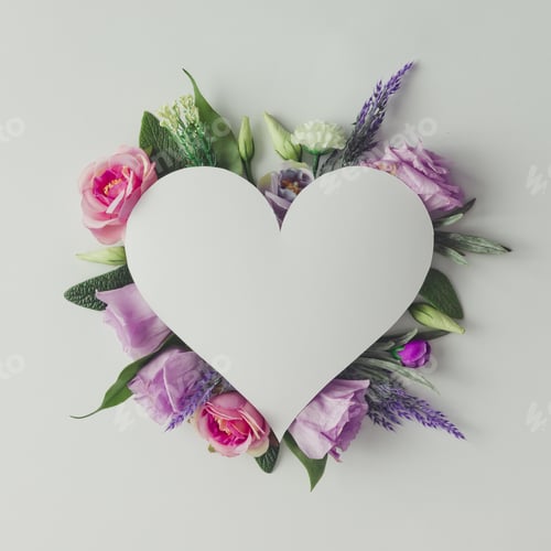 Preview: Creative layout with colorful flowers, leaves and heart shape. Anniversary concept.Flat lay.