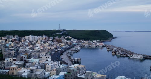 Preview: Penghu, Taiwan 27 June 2022: Xiyu township fishing village in Penghu of Taiwan at sunset