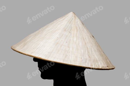 Preview: Man with traditional hat from Asia made of wicker