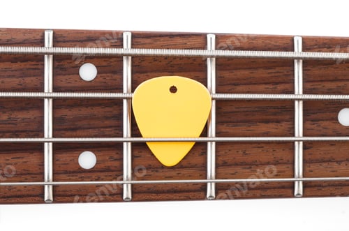 Preview: Metallic Volume Treble Guitar Bass Knobs. Electric Guitar. Red Electric Bass Guitar Close-Up
