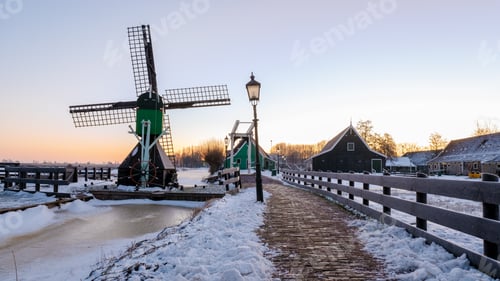 Preview: Zaanse Schans windmill village during winter with snow landscape in the Netherlands