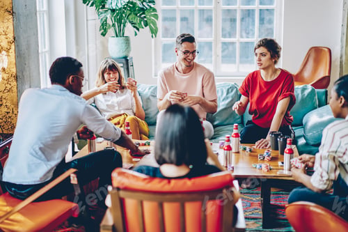 Preview: Group of friends playing at table